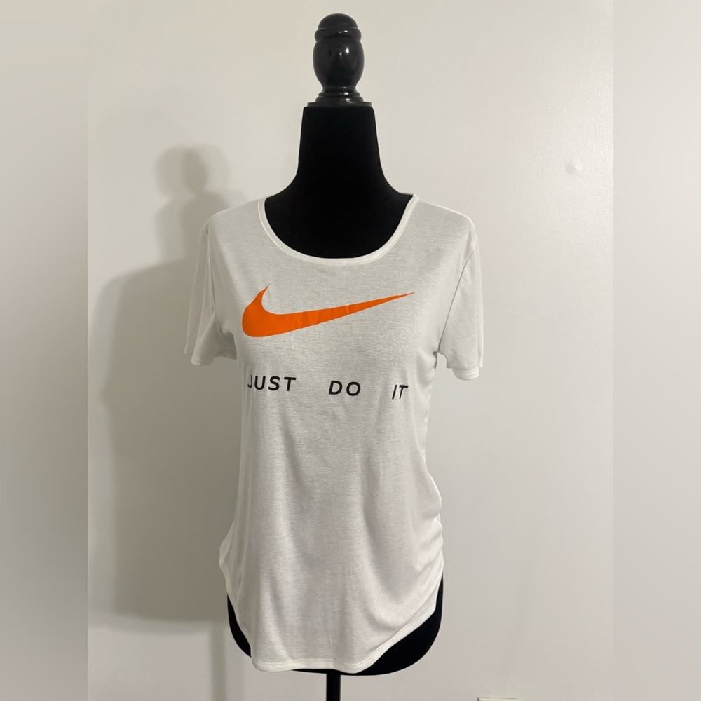Nike Women's Tee with Orange logo.